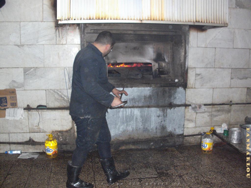 DERNIER FOUR DE CALENTICA AU FEU DE BOIS (2).JPG - Traveler DC 120                